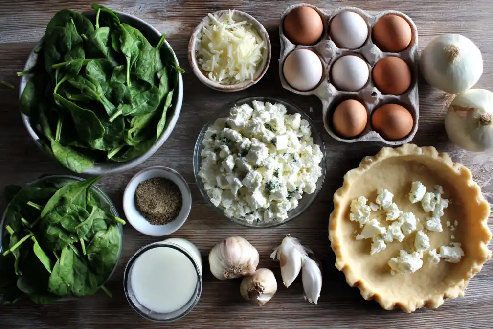 Fresh spinach, feta cheese, eggs, onion, garlic, milk, pie crust