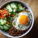 Homemade ground-beef bulgogi rice bowl with kimchi and egg