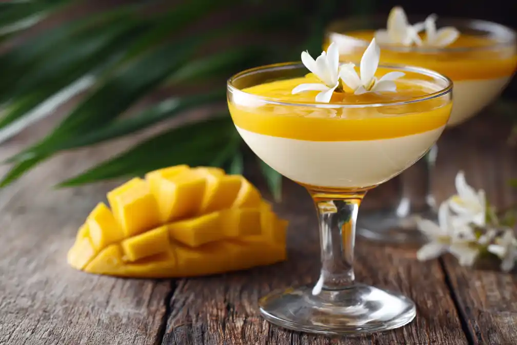 Gluten free mango cream dessert in elegant glass