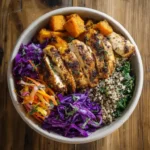 sweetgreen hot honey chicken bowl with quinoa and roasted sweet potatoes
