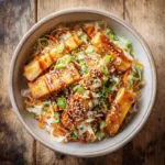 Vegan egg roll in a bowl with tofu, cabbage, and carrots