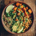 Vibrant vegan grain bowl with chickpeas, quinoa, and sweet potatoes