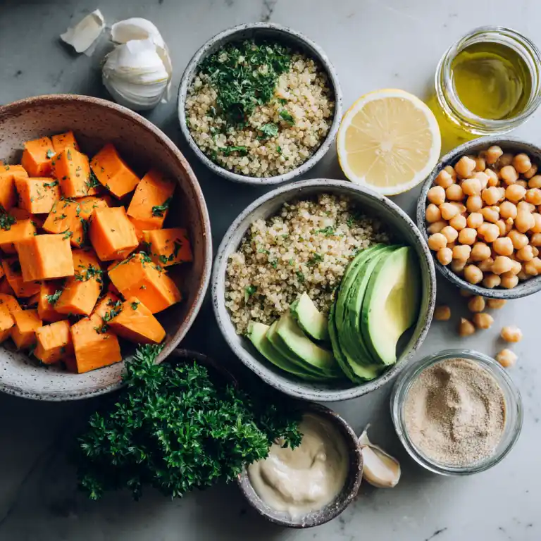 Vegan grain bowl ingredients including quinoa, chickpeas, and avocado